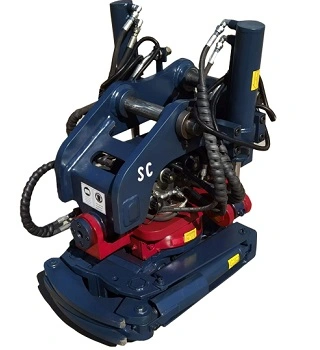 Excavadora tiltrotadora y acoplador rápido
